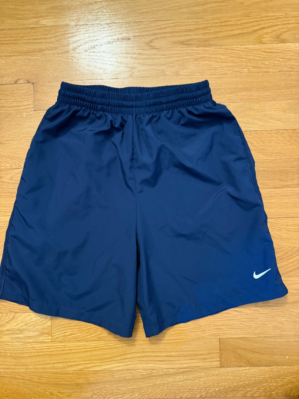 Nike Kids navy dry-fit Athletic Shorts with White Swoosh. XL (12-14)